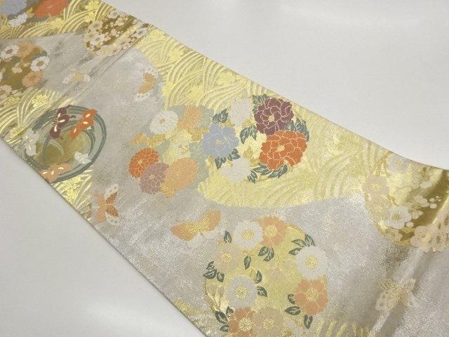 荒波に花輪・蝶模様織り出し袋帯