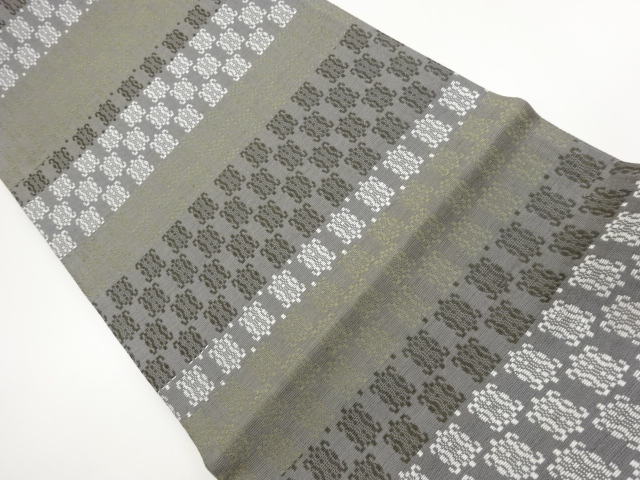 横段に抽象模様織出し袋帯