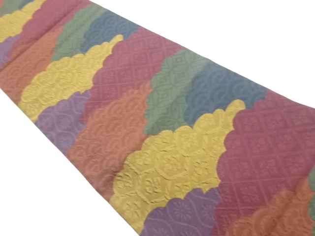 ふくれ織雲に古典柄模様織出し袋帯