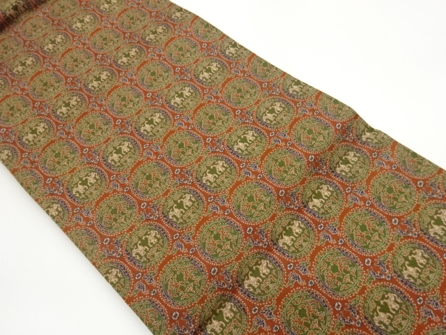 丸に鳥獣模様織出し名古屋帯