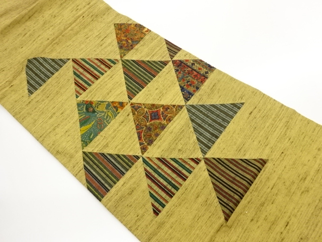 手織り紬切り嵌め相良刺繍鱗に縞・花葉模様織出し名古屋帯