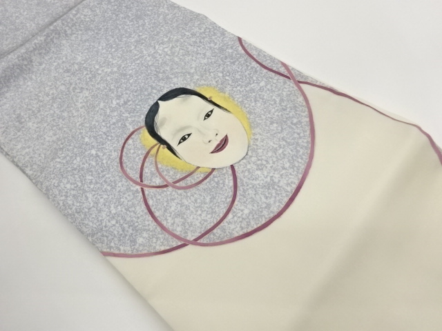 手描き金彩組紐に能面模様名古屋帯