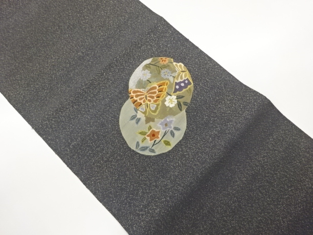 綴れ丸文に蝶・草花模様織出し名古屋帯