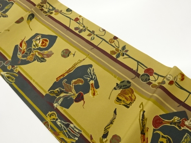 金彩野菜に地紙縞模様開き名古屋帯（額縁仕立て）